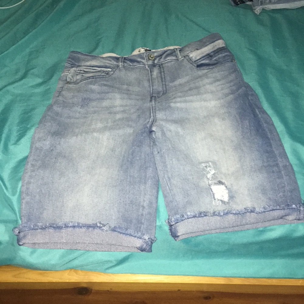 Light blue ripped shorts